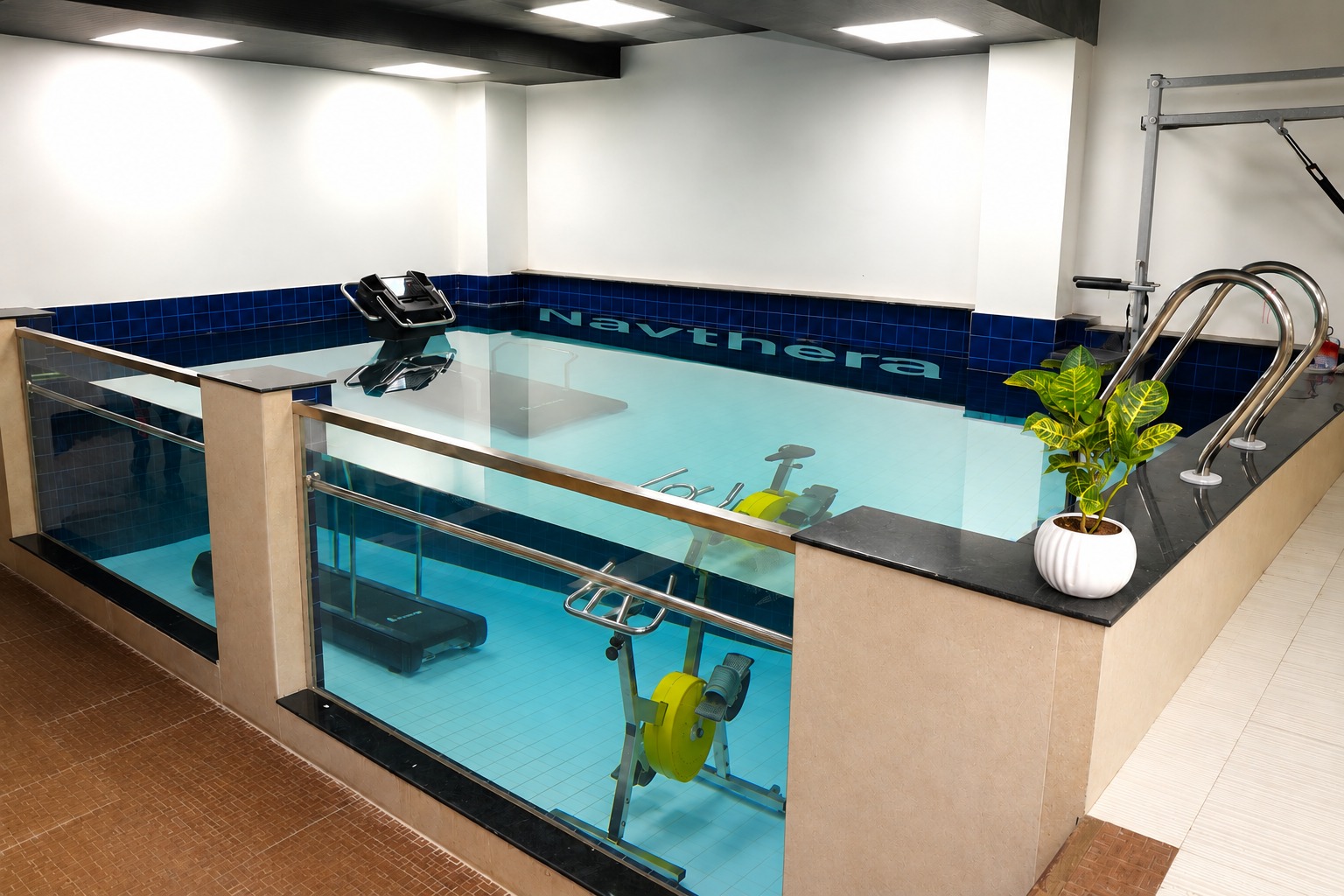 Navthera's aquatherapy pool with underwater treadmill and aqua bike